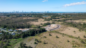 Wide overhead view of Cumulus site with landscaped grounds and planned residential buildings
