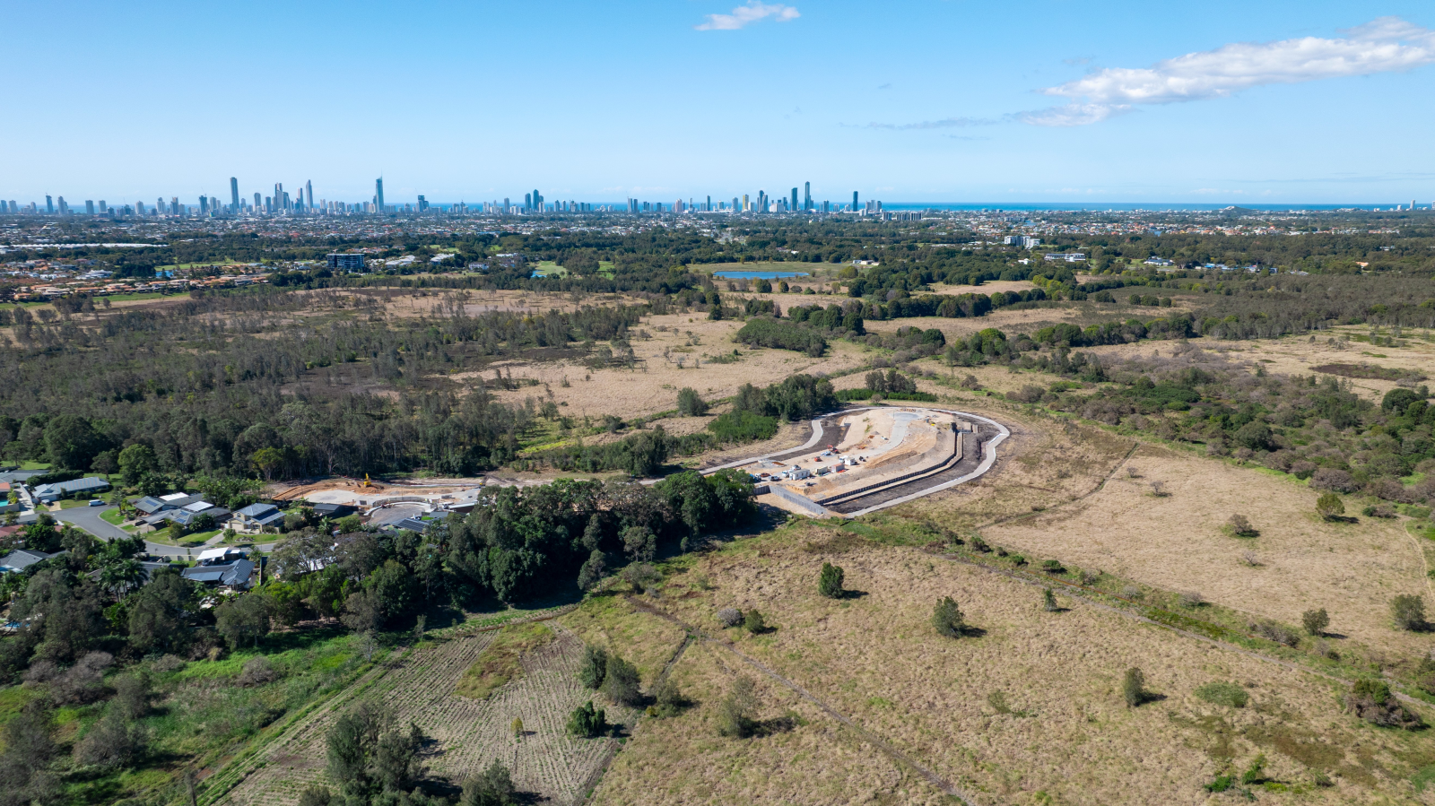 Wide overhead view of Cumulus site with landscaped grounds and planned residential buildings